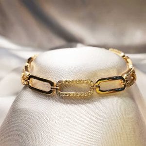 دستبند زنانه بیضی تو خالی طرح نگین دار مدل XUPING 2282 وکسوز