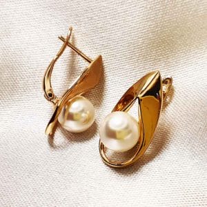 گوشواره زنانه تک مروارید طرح پایه صدف ژوپینگ مدل XUPING 1628 وکسوز