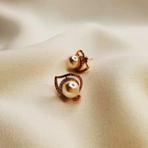 گوشواره زنانه مرواریدی نگین اتمی طرح قو ژوپینگ مدل XUPING 5641 در فروشگاه وکسوز