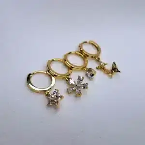 گوشواره زنانه گل پنج پر نگین باگتی و پروانه مدل Kanamina 6709 در فروشگاه وکسوز